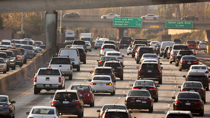 This Dec. 12, 2018, file photo shows traffic on the Hollywood Freeway in Los Angeles. The Trump administration is rolling back tough Obama-era mileage standards and gutting one of the United States' biggest efforts to slow climate change. The administration released its relaxed mileage rules Tuesday.