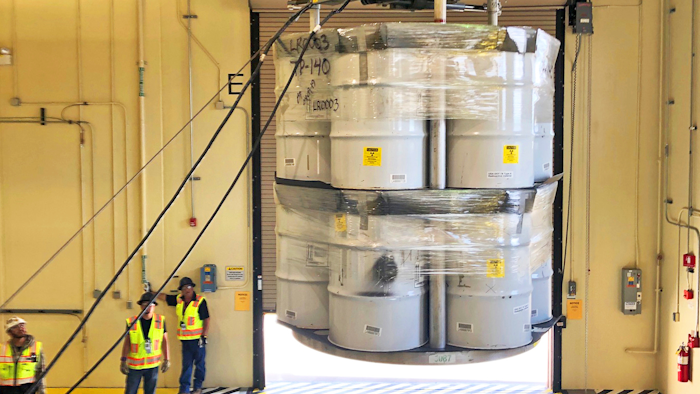 In this April 2019 file photo provided by Los Alamos National Laboratory, barrels of radioactive waste are loaded for transport to the Waste Isolation Pilot Plant (WIPP) at the Radioactive Assay Nondestructive Testing (RANT) facility in Los Alamos, N.M.