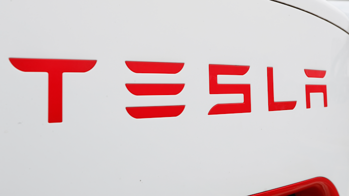 This Wednesday, March 18, 2020, file photo, shows a Tesla charging station for automobiles in Port Huron, Mich. T