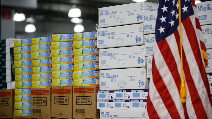 In this March 24, 2020, file photo stacks of medical supplies are housed at the Jacob Javits Center that will become a temporary hospital in response to the COVID-19 outbreak in New York.