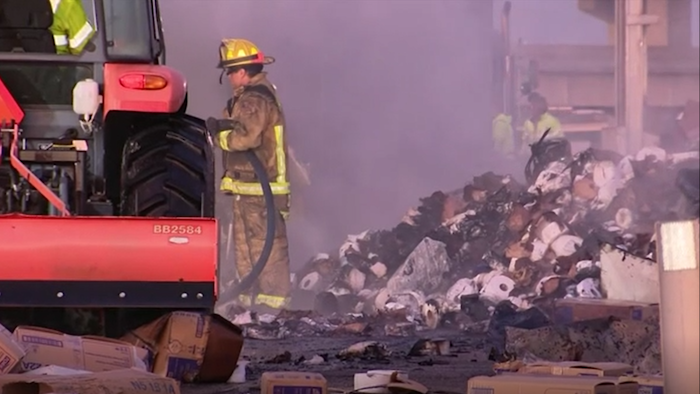 A tractor-trailer hauling toilet paper crashed and caught fire near Dallas early Wednesday, spilling the hot commodity all over an interstate.