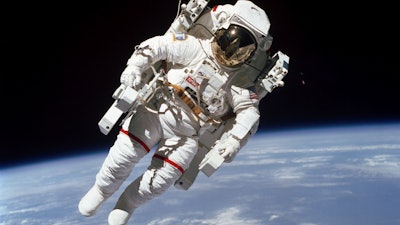In this Feb. 7, 1984 photo made available by NASA, astronaut Bruce McCandless II, performs a spacewalk a few meters away from the cabin of the Earth-orbiting space shuttle Challenger, using a nitrogen-propelled Manned Maneuvering Unit.