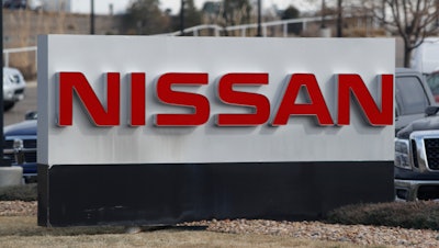 In this March 15, 2020, photograph, the company logo stands outside a Nissan dealership in Highlands Ranch, Colo. Nissan is recalling more than a quarter-million SUVs, trucks and vans worldwide, Thursday, April 2, to replace potentially dangerous Takata air bag inflators. The vehicles have air bags with volatile ammonium nitrate that can explode with too much force and hurl shrapnel.