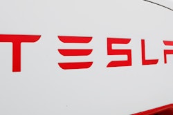 This Wednesday, March 18, 2020, file photo, shows a Tesla charging station for automobiles in Port Huron, Mich. T