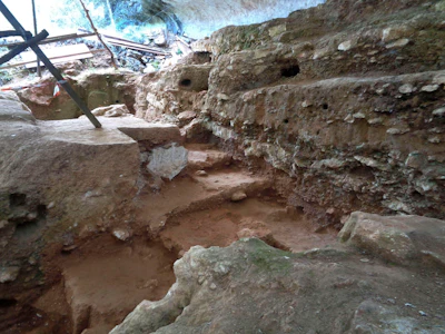 This photo provided by Marie-Helene Moncel in April 2020 shows a Neanderthal excavation site in Abri du Maras, France, where researchers said they found the oldest known manufactured fiber. The specimen is a quarter-inch-long, made of 3 bundles of tree-bark fibers twisted together, with an age of some 40,000 to 50,000 years.