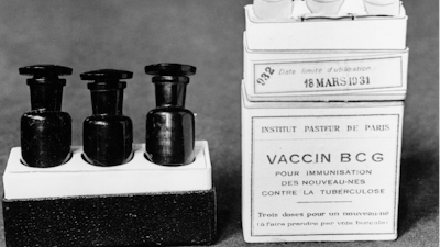 This March 1931 file photo shows ampules of the BCG vaccine against tuberculosis in a laboratory at the Institute Pasteur in Paris, France. Dec. 2, 1947 file photo. Scientists are dusting off some decades-old vaccines against TB and polio to see if they could provide stopgap protection against COVID-19 until a more precise shot arrives.