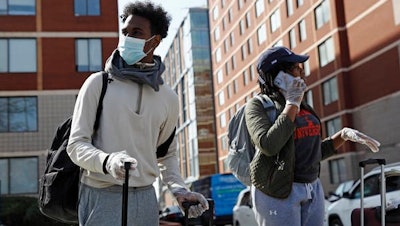 When universities closed their dorms during the coronavirus outbreak, it meant breaking contracts with students. Many schools, including Howard University, shown here, have agreed to pay partial refunds.