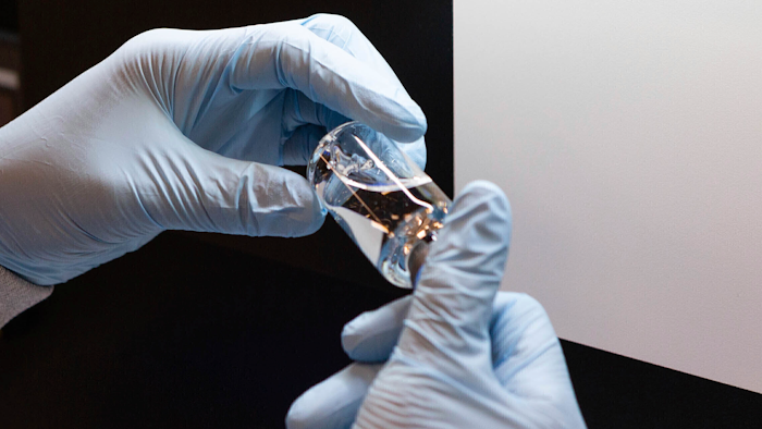 In this March 2020 photo provided by Gilead Sciences, a vial of the investigational drug remdesivir is visually inspected at a Gilead manufacturing site in the United States. On Wednesday, April 29, 2020, the company says its experimental antiviral drug has proved effective against the new coronavirus in a major U.S. government study that put it to a strict test.