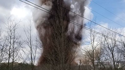 Smoke rises from the Androscoggin Mill after an explosion, April 15, 2020, in Jay, Maine.