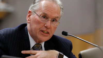 In this Nov. 18, 2019, file photo, Pacific Gas & Electric CEO Bill Johnson speaks during an oversight hearing of the Energy, Utilities and Communications committee at the Capitol in Sacramento, Calif.