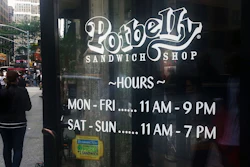 People walk past a Potbelly Sandwich shop in New York.