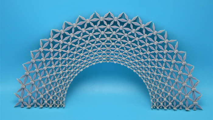 This structured lattice-type material protects against both types of energy waves -- longitudinal and sheer -- that can travel through the ground.