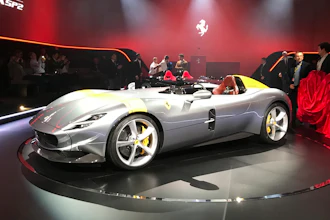 In this Sept. 18, 2018 file photo, the Ferrari Monza SP1 car is displayed in Maranello, Italy. Luxury sports carmaker Ferrari on Monday, May 4, 2020, significantly lowered full-year earnings guidance due to the COVID-19 pandemic, but acknowledged that the new outlook assumes a sharp recovery in the second half of the year.