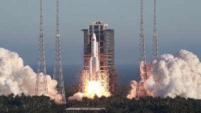 China's new large carrier rocket Long March 5B blasts off from the Wenchang Space Launch Center, May 5, 2020.