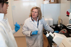 Judy Mikovits talks to a research associate at the Whittemore Peterson Institute for Neuro-Immune Disease, Reno, Nev., Feb. 28, 2011.