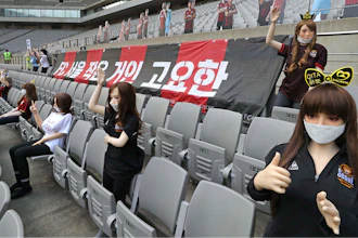 In this May 17, 2020, photo, cheering mannequins are installed at the empty spectators' seats before the start of a soccer match between FC Seoul and Gwangju FC at the Seoul World Cup Stadium in Seoul, South Korea. A South Korean professional soccer club has apologized after being accused of putting sex dolls in empty stands during a match Sunday in Seoul. In a statement, FC Seoul expressed 'sincere remorse' over the controversy, but insisted that it used mannequins, not sex dolls, to mimic a home crowd during its 1-0 win over Gwangju FC at the Seoul World Cup stadium.