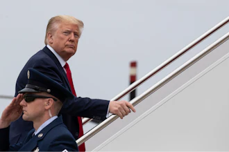 President Donald Trump boards Air Force One as he departs Thursday, May 21, 2020, at Andrews Air Force Base, Md. Trump will visit a Ypsilanti, Mich., Ford plant that has been converted to making personal protection and medical equipment.