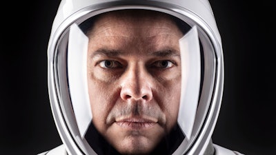 This undated photo by SpaceX shows NASA astronaut Bob Behnken in his spacesuit at SpaceX headquarters, Hawthorne, Calif.