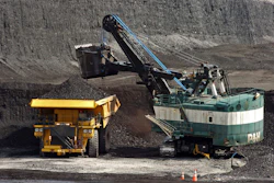 A mechanized shovel loads coal onto a haul truck at Cloud Peak Energy's Spring Creek mine near Decker, Mont., April 4, 2013.
