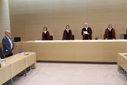 Presiding Judge at the Federal Court of Justice Stephan Seiters, center, announced the verdict in the trial between the Volkswagen company and the owner of a VW Diesel passenger car Herbert Gilbert, left, in Karlsruhe, Germany, May 25, 2020.