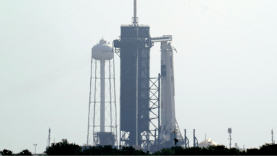 The SpaceX Falcon 9, with the Crew Dragon spacecraft on top of the rocket, sits on Launch Pad 39-A Thursday, May 28, 2020, at Kennedy Space Center in Cape Canaveral, Fla. Wednesday's planned launch was scrubbed due to weather. They will try again to launch Saturday.