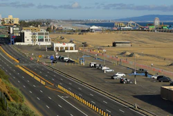 In this March 23, 2020 file photo, light traffic and a mostly empty parking lot is seen along Pacific Coast Highway, in Santa Monica, Calif. 2020. The U.S. government is estimating that traffic deaths fell 1.2% last year to 36,120. The National Highway Traffic Safety Administration says it’s the third year in a row that fatalities dropped.