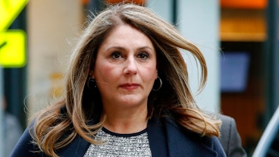 In this Feb. 25, 2020, file photo, Michelle Janavs arrives at federal court in Boston for sentencing in a nationwide college admissions bribery scandal.
