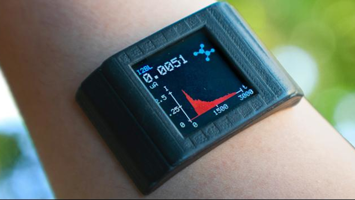 The underside of this custom-built smartwatch contains a double-sided adhesive that can detect metabolites and nutrients present in body sweat.