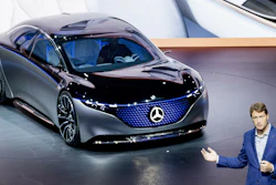 Ola Kaellenius, head of Mercedes-Benz, next to a Vision EQS car at the IAA Auto Show, Frankfurt, Germany, Sept. 10, 2019.