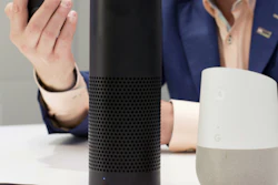 An Amazon Echo, center, and a Google Home, right, are displayed in New York, June 14, 2018.