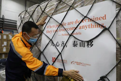 A worker prepares the first batch of donation from the Jack Ma Foundation and Alibaba Foundation bound for Africa.
