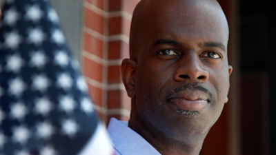 Gregory Minott stands in front of Town Hall in Andover, Mass., June 12, 2020.