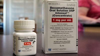 Packages of Dexamethasone are displayed in a pharmacy, Tuesday, June 16, 2020, in Omaha, Neb. Researchers in England said Tuesday they have the first evidence that the drug can improve COVID-19 survival. The cheap, widely available steroid called dexamethasone reduced deaths by up to one third in severely ill hospitalized patients.