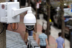 In this April 14, 2014, file photo, a surveillance camera is attached to a light pole along Boylston Street in Boston. The Boston City Council voted unanimously, Wednesday, June 24, 2020, to pass a ban on the use of facial recognition technology by city government.