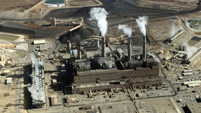 This Nov. 9, 2009, file photo, shows the coal-fired San Juan Generating Station near Farmington, N.M.