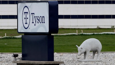 In this May 1 photo, a sign sits in front of the Tyson Foods plant in Waterloo, IA. Civil rights attorney Tom Frerichs filed a lawsuit on Thursday, June 25 behalf of the estates of three Tyson Foods workers at its pork processing plant in Waterloo who died after contracting coronavirus.
