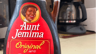 A bottle of Aunt Jemima syrup sits on a counter, Wednesday, June 17, 2020 in White Plains, N.Y. Pepsico is changing the name and marketing image of its Aunt Jemima pancake mix and syrup, according to media reports. A spokeswoman for Pepsico-owned Quaker Oats Company told AdWeek that it recognized Aunt Jemima’s origins are based on a racial stereotype and that the 131-year-old name and image would be replaced on products and advertising by the fourth quarter of 2020.