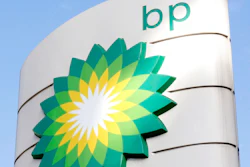 This Tuesday, Aug. 1, 2017 file photo shows the BP logo at a petrol station in London. Energy company BP is writing off as much as $17.5 billion from its oil and gas assets and will review its plans to develop oil wells as the COVID-19 pandemic accelerates its goal of decreasing its reliance on fossil fuels.