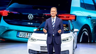 In this file photo dated Monday, Sept. 9, 2019, CEO of Volkswagen Herbert Diess introduces the new VW ID.3 at the IAA Auto Show in Frankfurt, Germany. The German automaker Volkswagen said Monday June 8, 2020, that CEO Herbert Diess is giving up managing the company’s core VW brand in order to concentrate more on the group as a whole.