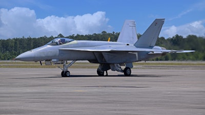 The first Super Hornet for the U.S. Navy's Blue Angel flight demonstration squadron sits on the flight ramp at Boeing's Cecil Field facility in Jacksonville, Florida. The validation and verification aircraft will not be painted in the familiar blue and yellow paint scheme until flight testing is complete.