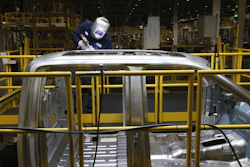 Ron Hudgins welds a Ford F-150 cab at the Dearborn Truck Plant in Dearborn, Mich., Nov. 11, 2014.