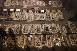 Rubble remains after residences were leveled by the Camp wildfire in Paradise, Calif.