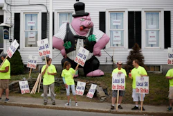 Strikers picket outside the district lodge of Local 6 across from Bath Iron Works.