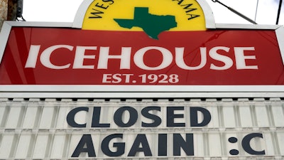 A sign outside the West Alabama Icehouse bar in Houston, June 29, 2020.