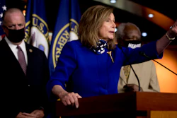 House Speaker Nancy Pelosi of Calif., accompanied by Rep. Dan Kildee, D-Mich., left, and Rep. Danny Davis, D-Ill., right, speaks at a news conference on Capitol Hill in Washington on Friday, July 24, on the extension of federal unemployment benefits.