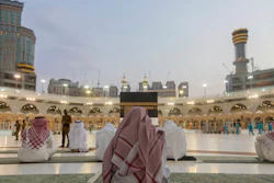 Pilgrims pray around the Kaaba, the square structure in the Great Mosque, Mecca, Saudi Arabia, July 26, 2020.