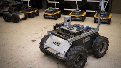 A small, unmanned Clearpath Husky robot, which was used by ARL researchers to develop a new technique to quickly teach robots novel traversal behaviors with minimal human oversight.