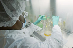 A researcher tests possible COVID-19 antibodies in a laboratory in Indianapolis, May 2020.