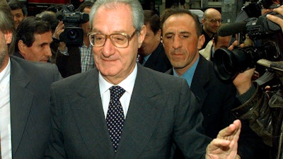 Cesare Romiti arrives at a Confindustria industrialists association meeting in Milan, Oct. 16, 1997.