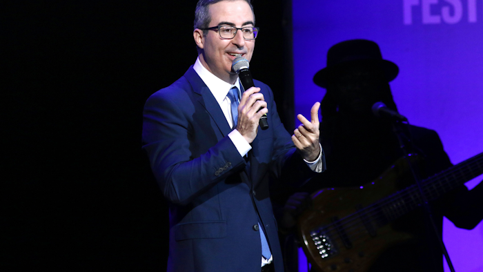 John Oliver performs at the 13th annual Stand Up For Heroes benefit concert.